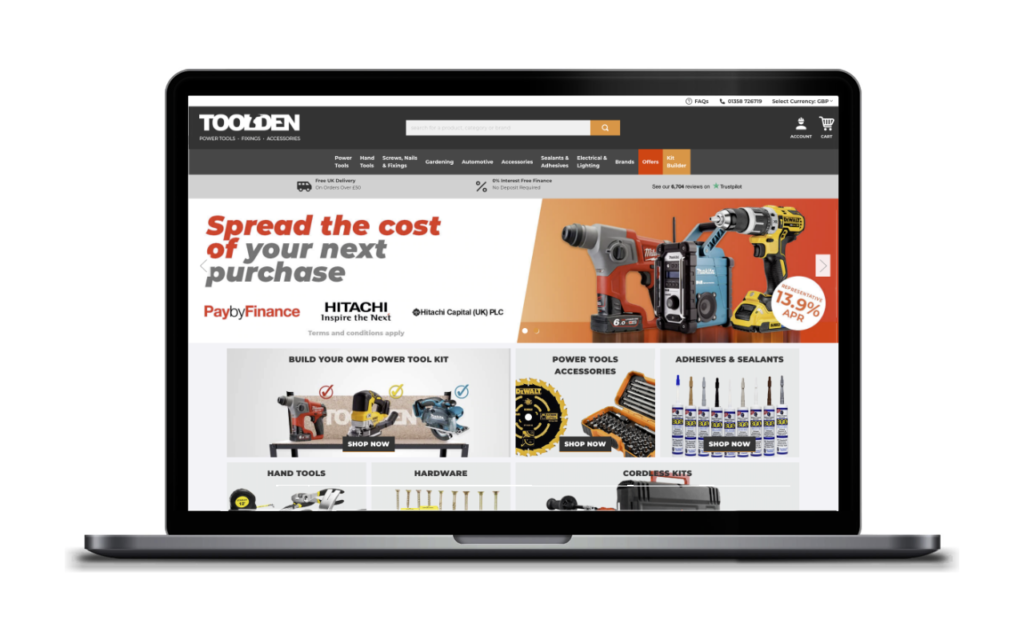 Toolden's website on macbook screen