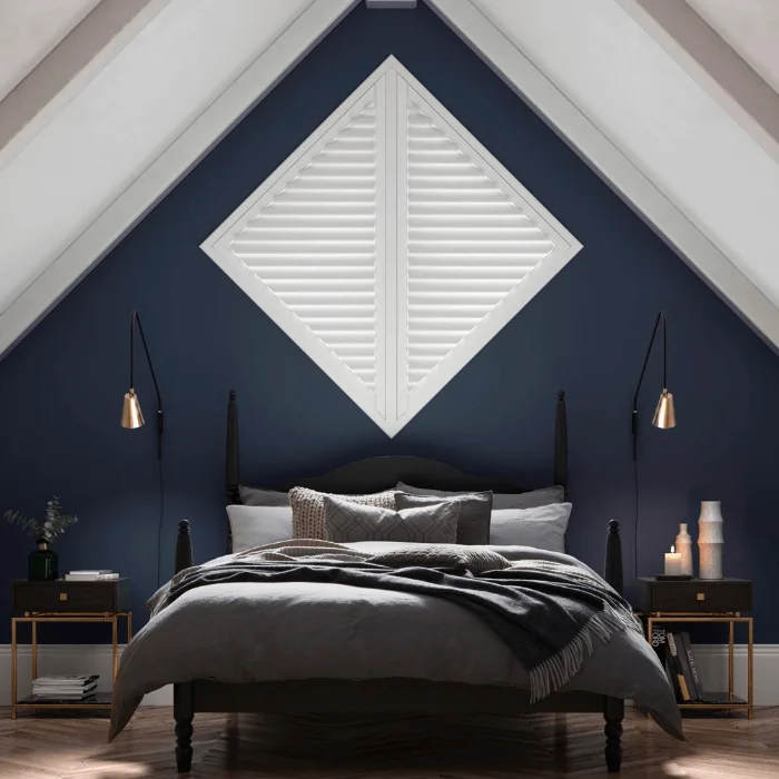 bedroom with blinds in diamond shaped window
